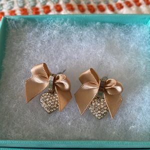 Heart shaped with bow stud earrings